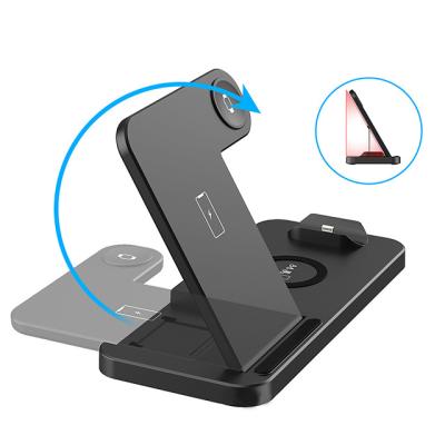 China Foldable Tablet Dock Charging Station 4 in 1 15W Fast Wireless Charger Stand Multifunctional Charger for Airpods iPhone Watch for sale