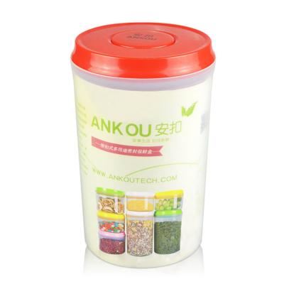 China Individual Freshness Preservation Top Push Button Circle Around Dried Fruit Sealed Plastic Food Storage Container 2L for sale