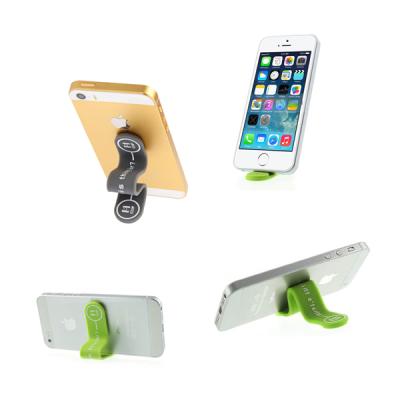 China Creative Portable Multi-Function Mobile Multi-Function Mobile Holder Clip Mini Silicone Cable Winder Cable M-Clip Magnetic Phone Holder /Clip Band Gift Strip for sale