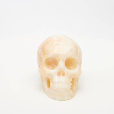 China Wholesale Low Price Small Mini Bulk Crystal White Jasper Carved Skulls For Decoration Or Gifts for sale