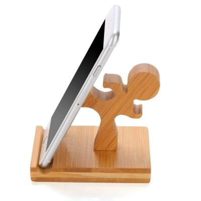 China China Best Selling Smooth Convenient Multi Functional Handmade Desktop Decor Solid Wood Cell Phone Stand for sale