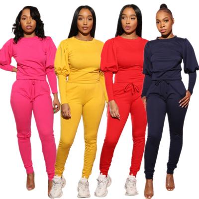 China Solid Color Breathable Women's Open Waisted Flared Pants Crop Top Overalls Casual Clothing Two Piece Set for sale