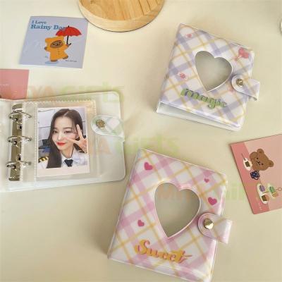 China Cloth Color Photo Album Collection Book PVC Vinyl K-Noise Cover with Hollow Heart Shape Star Backing Button Closure for sale