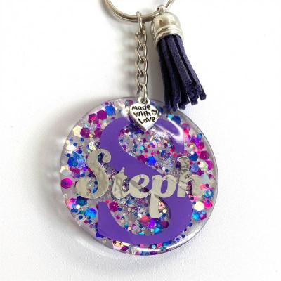 China Custom Glitter Plastic Sequin Plastic Resin Acrylic Key Chain Wedding Name Monogram Keychain for sale