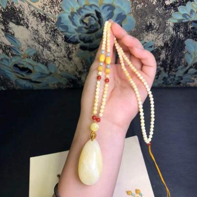 China CLASSIC Popular Exquisite Natural Amber White Flawless Beautiful Drop Pendant Beads Chain Necklace for sale