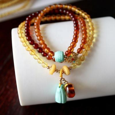 China CLASSIC Gradient Rainbow Color Ping An Buckle Turquoise Natural Amber Freckle Beads Bracelets For Price for sale