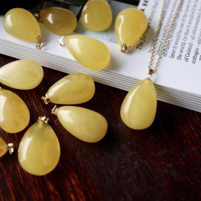 China Vintage Wholesale 18k Gold Full Natural Jewelry Amber Butter Yellow Water Droplets Custom Religious Pendants for sale