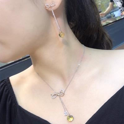 China Cute Bow Fashion Natural Blue Natural Cool Earring And Necklace Sets Amber Jewelry Amber Jewelry Sets for sale