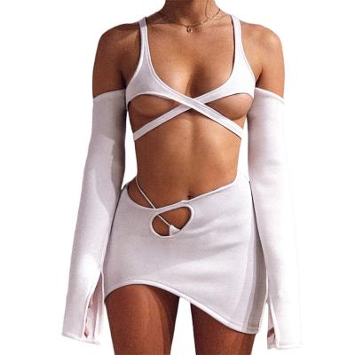 China 2022 Summer Women's Fashion QUICK DRY Two Piece Strap Cavity White Long Sleeve Crop Top and Short Sexy Bodycon Skirt Set for sale