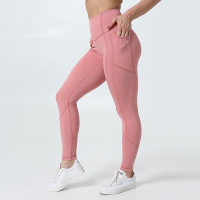 China Custom Solid 4 Way Stretch Anti-UV Sports Pants High Waist Fitness Pink Women Yoga Legging With Pockets for sale