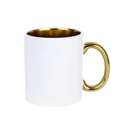 China Sustainable 11oz Gold Handle Sublimation Mug Customize Gold Plated Color Magic Ceramic Coffee Mug for sale