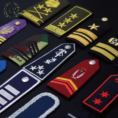 China Custom Lightly Crafted Embroidery Shoulder Pads with Logos in Different Techniques for sale