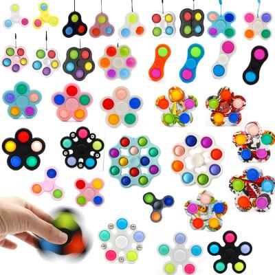 China Spinner Portable Simple Silicone Spinner Brain Push Portable Single Silicone Hand Finger Spin Sensory Spin Mini Keychain Fidget Toys for sale