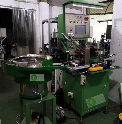 China Máquina de recorte totalmente automática de vacío para sellos de aceite y piezas de caucho; Máquina de recorte;Alimentación automática y recorte automático; en venta