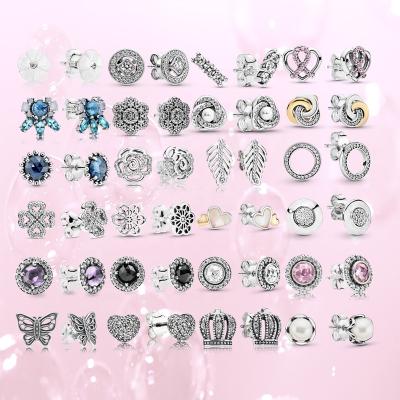 China Fashion Jewelry High Quality 925 Sterling Silver Fine Charm Earrings Charm Hollow Round Crown Earrings Ear Studs for sale