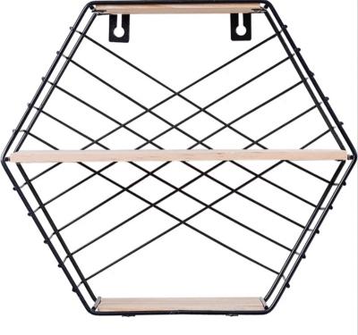 China Hexagon Storage Wall Grid Iron Art Wall Hanging Living Room Wall Decoration Partition Rack for sale