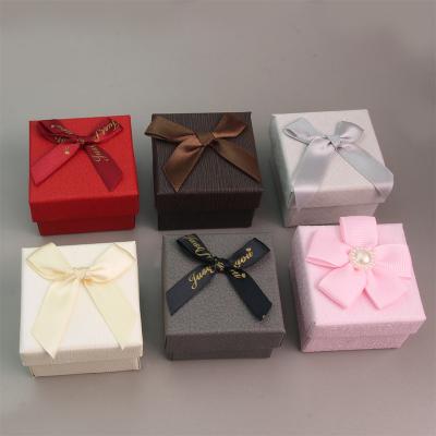 China Packaging Jewelry Bow Paper Jewelry Box One Piece Drop Shipping Delivery Support Custom Ring And Necklace Random Printing Jewelry Box for sale