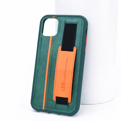 China Anti-fall PU Leather Wrist Strap Back Cover Logo Kickstand Phone Cases Custom Made For iPhone 11 12 pro max for sale