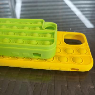 China Shockproof Soft Silicone Cell Phone Case Decompression Artifact Push Bubble Bumpy Person Toy for sale