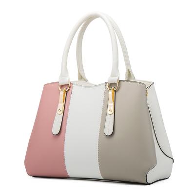 China Polyester 2021 steamed stuffed women's bag four cross-slung muffin mother's shoulder handbag one color women's bag new fashion contrast women for sale