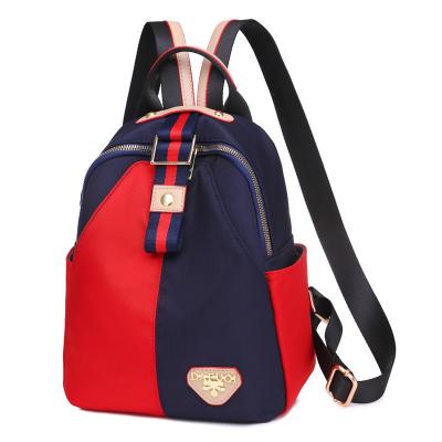 China 2021 new autumn female Korean fashion backpack fashion backpack outdoor travel bag against color women's leisure backpack for sale