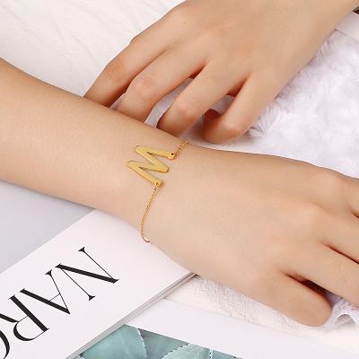 China Newest Gold TRENDY Jewelry Adjustable Link Chain Charm Stainless Steel Letter Bracelet for Women and Men for sale