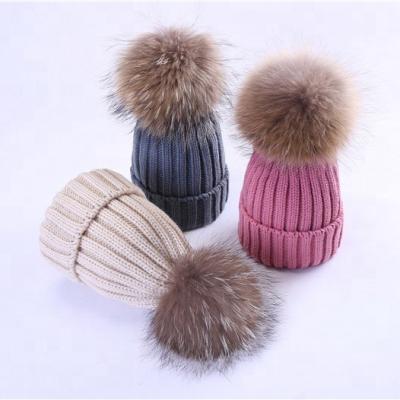 China JOINT Warm Winter Ladies Designer Womens Knitted Hat Caps With Ball for sale