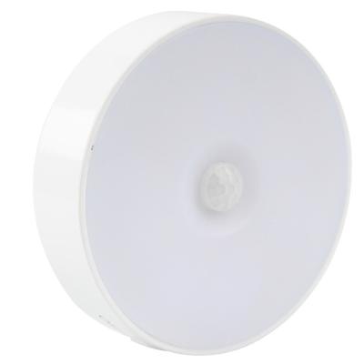 China New post-modern intelligent battery round body induction light night motion induction light hallway mobile and convenient night light for sale