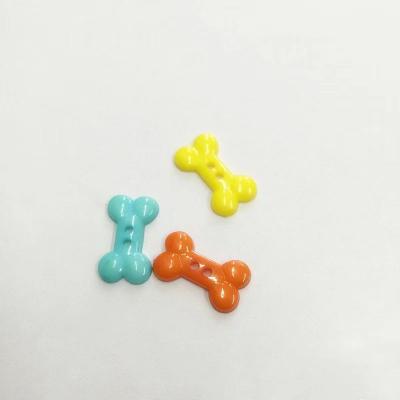 China Colorful Cartoon Toy Children Clasp Dog Bones Type Plastic Button Plush Doll DIY for sale