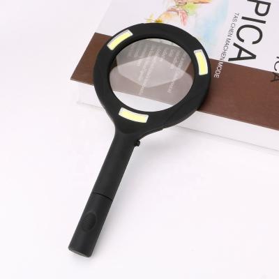 China Pelletizing 3 COB LED Magnifier Handheld 3X Flashlight Illuminated Magnifying Aid Reading For Seniors Loupe Jewelry Repair Tool AA for sale