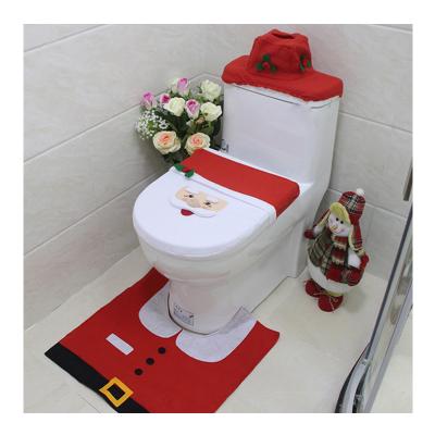 China Reversible Christmas Santa Pattern Bath Mat Anti Slip Bathroom Mats 3 Pieces Set Toilet Seat Covers Water Tank Hood Pad And Pedestal Cover for sale