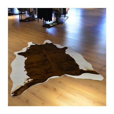 China Luxury Soft Imitation Cowhide Area Rug Rug Faux Cow Animal Hide Leather Furry Skin For Living Room Home for sale