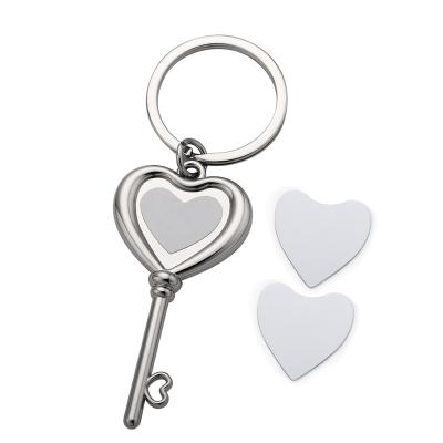 China Blank Promotion Love Heart Sublimation Metal Photo Keychain With Two Disc Insert Key Chain for sale