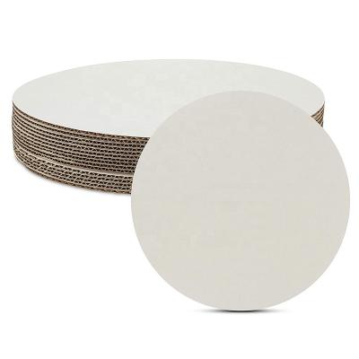 China Waterproof high quality round cake boards wholesales price cheap pizza cake corrugated paper pad for sale