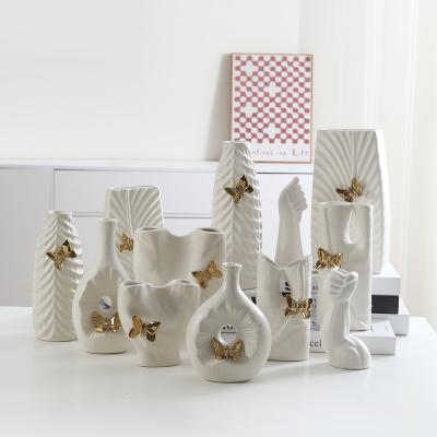 China Modern Decoration Nordic Modern Carpet White Vase With Gold Butterfly Table Top Vase Ceramic Hand Made For Hotel Living Room Restaurant for sale