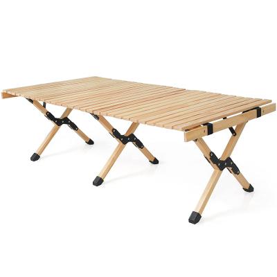 China Lightweight Portable Beach Picnic Table Folding Wooden Camping Tables Beech Wood Roll Up Travel Table With Carry Bag for sale