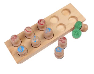 China Teaching popular wooden learning games educational vegetable toys montessori stamp for sale