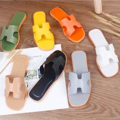 China 2021New Fashion Trend Design Wholesale Home Slippers For Flat Beach Flip Flop Women Ladies Slippers for sale