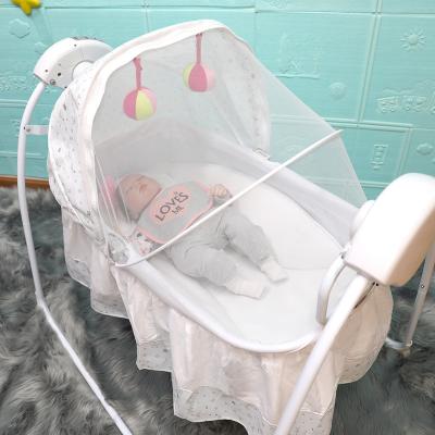 China Modern Indoor Newborn Bed Indoor Remote Control Automatic Electric Swing Baby Hutch Hanging Cradle For Infant for sale