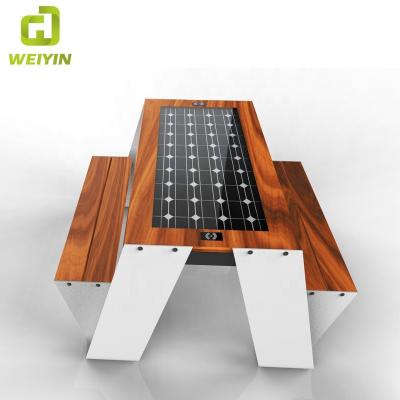 China Modern Solar Powered Phone Charging Smart Outdoor Garden Picnic Table For Restaurants Hotels for sale