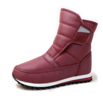 China Fashion Trend Solid Color Genuine Leather Women's Winter Waterproof Fashion Striped Snow Boots for sale