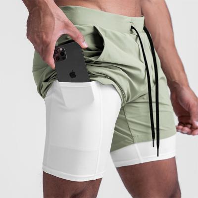 China Wholesale 5 Inch QUICK DRY 2 Custom Compression In 1 Double Layer 4 Way Men's Sporty Stretch Workout Fitness Sport Shorts for sale