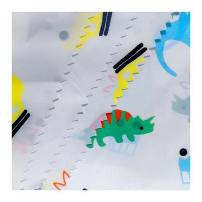 China China Supplier Wholesale Raincoat 100% Nylon or 100% Polyester Fabric Cartoon Dinosaur Down Jacket Fabric for sale