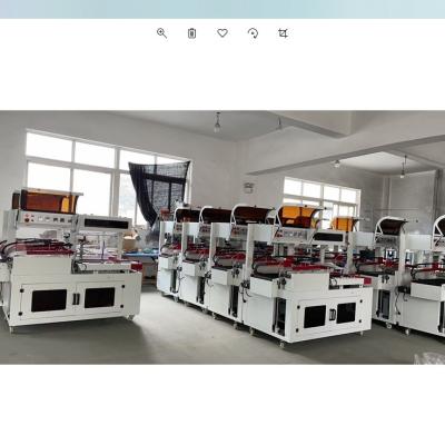 China Guangzhou POF Photoelectric Automatic Mobile Cellophane Check Wrapping Machine for sale