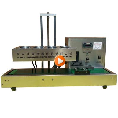 China Automatic Aluminum Food Table Top Lid Induction Cap Sealing Machine for sale