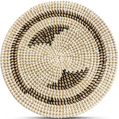 China Bohemian Vietnamese Home Decor Round Plant Plankton Handwoven Wall Hanging Basket Vietnam Woven Wall Decor for sale