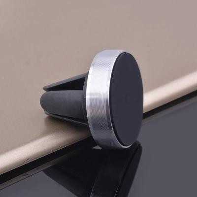 China Universal 360 Car Phone Holder Mini Stand Cell Phone Magnet Mount Car Holder For iPhone For Samsung for sale