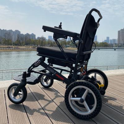 China Newest Powerful And Lightweight Aluminum Power Wheelchair Lightweight Foldable Lithium Battery Portable Electric Wheelchair for sale