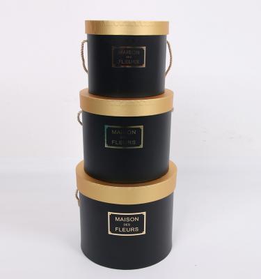 China 3390 Handmade Black And Gold Lid Boxes Flower Shipping Boxes With Gold Foil Logo for sale