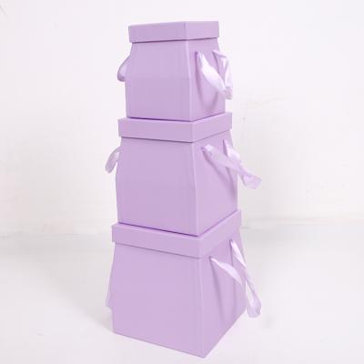 China Recycled Materials 3018 Custom Gift Box With Ribbon Handle Fashion Design Attractive Gift Box Set Of 3 for sale